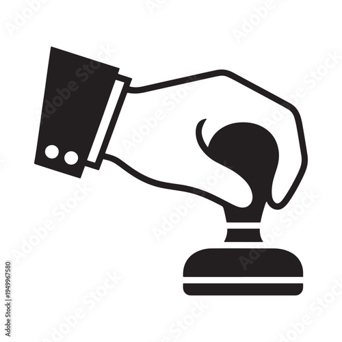 A hand holding a chess piece over a chessboard black and white