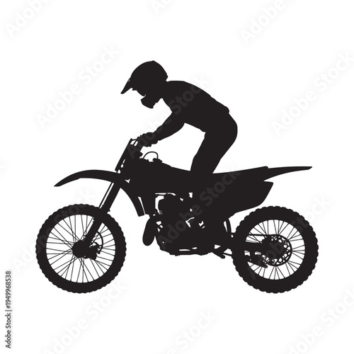 Silhouette of a motorcyclist riding a dirt bike in a dynamic pose
