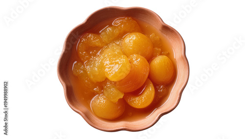 Foto Isolated bowl of sweet canned apricots in light syrup, delicious preserved fruit
