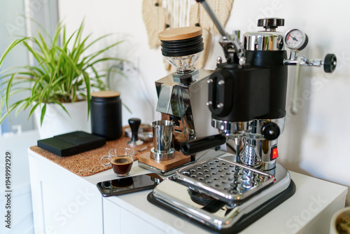 Wallpaper Mural Home barista station with manual lever espresso machine, single dose grinder, and a smartphone on the counter Torontodigital.ca