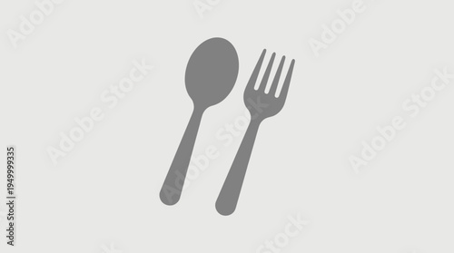 Simple grey graphic illustration of a spoon and a fork on a light background, representing dining utensils.