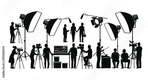 Silhouettes of professional film production crew operating cameras and lights on a studio set
