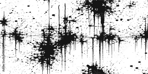 Abstract black ink splatter with the ink drops creating a visually appealing pattern. Capture the randomness and artistic appeal of ink blots.