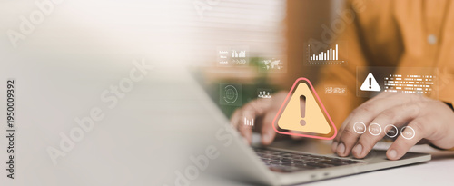 Cyber security warning alert on laptop screen with businessman typing on computer, digital risk monitoring, data breach protection, system error notification and technology safety concept for business