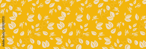 Seamless vector pattern with scattered stylized leaves on a warm yellow background. Minimal botanical design suitable for fabric, wallpaper, wrapping paper, packaging, stationery