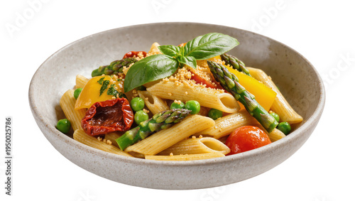 Isolated fresh penne pasta dish with green asparagus, peas, colorful vegetables, and basil