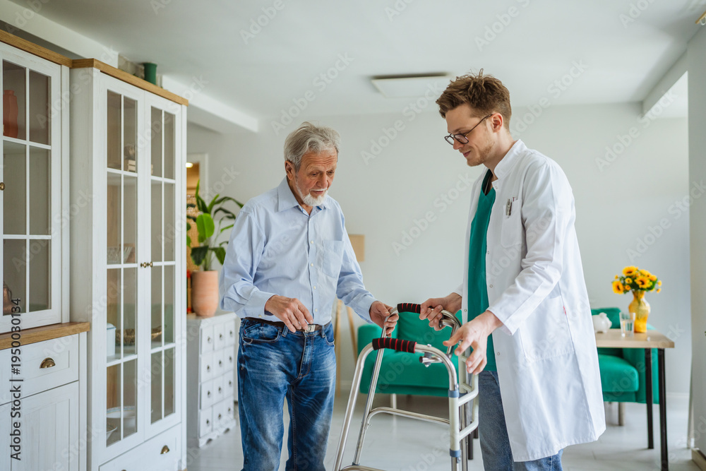 Fototapeta premium Healthcare professional assisting senior man using walker at home