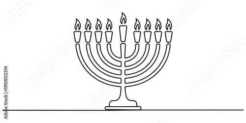 A traditional nine branched menorah with lit candles representing the jewish holiday of hanukkah