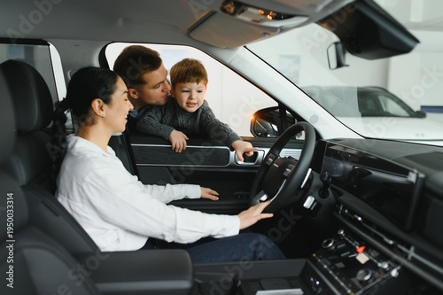 Canvas Print Family in a car dealership