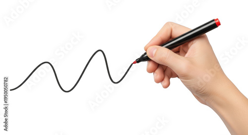 A close up view of a human hand holding a black permanent marker drawing a wavy line on a surface