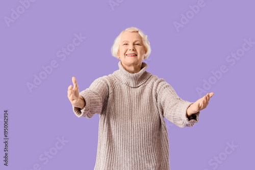 Senior woman opening arms f...