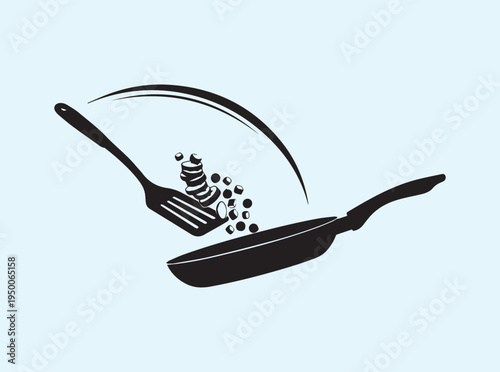 Centered view of a spatula and pan action isolated for professional use