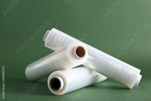 Rolls of stretch wrap on gr...