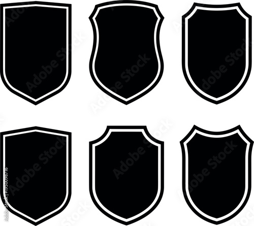 Set of blank black shield icons, vector protective security frames, heraldic crest shapes for logo and badge