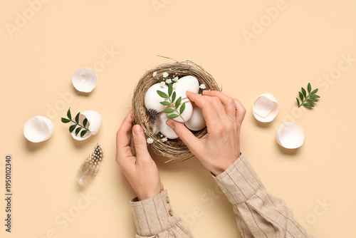 Female hands with Easter eg...
