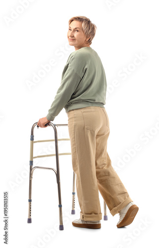 Mature woman using walker o...