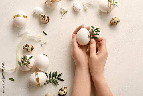 Female hands with Easter eg...