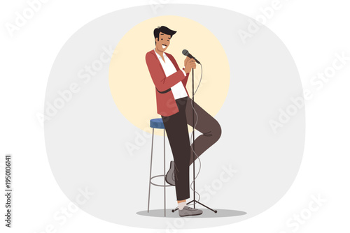 Stand-up show from man comedian standing on stage with microphone in hand, near high chair and spotlight. Guy performs solo program at stand-up show, trying to make audience laugh with funny stories