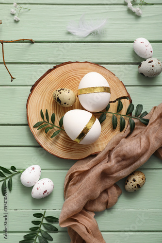 Board with Easter eggs and ...
