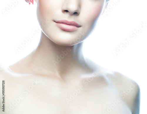 Close up lips and hands of beautiful young woman isolated on white background