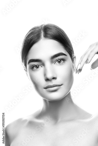 Monochrome beauty model girl with clean skin and natural nude make-up. Skincare facial treatment concept