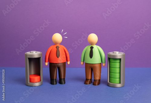 A spent employee is surprised by a full of energy colleague. Life work balance and personal wellbeing in the workplace. Burnout and fatigue contrasted with productivity and healthy work habits.