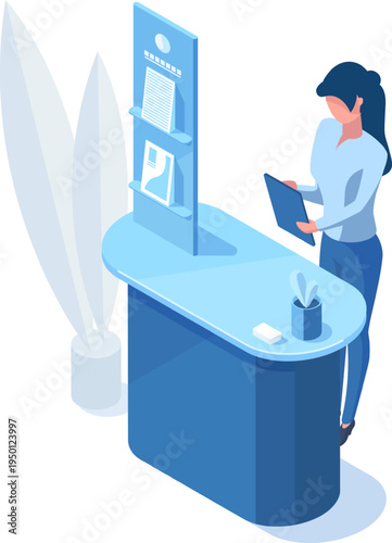 Woman working at reception counter using tablet