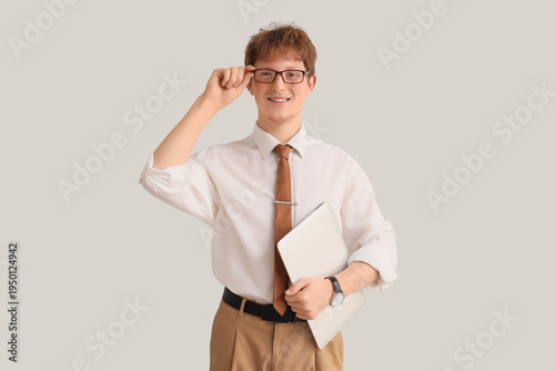 Young redhead businessman w...