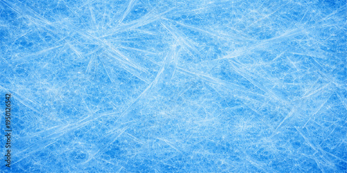 Abstract an icy surface with delicate, web-like patterns formed on a blue background. The textures and structures evoke a cold and serene ambiance.