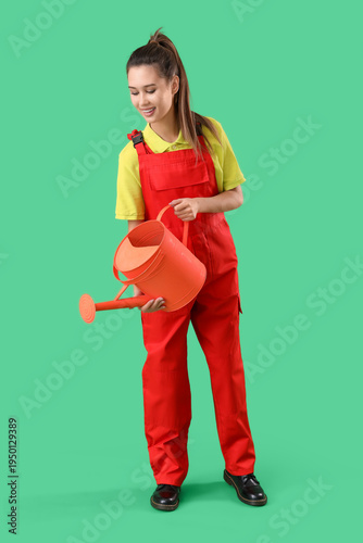 Young female gardener with ...