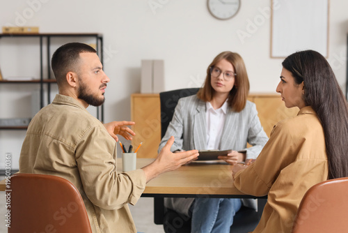 Young couple discussing pro...