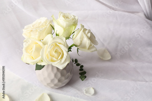 Vase with beautiful rose fl...
