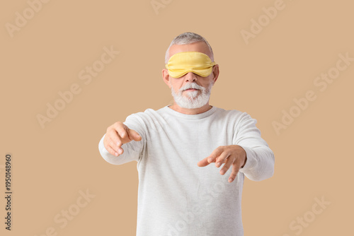 Senior male sleepwalker in ...