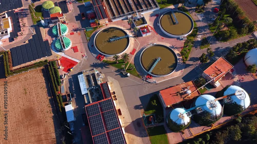 Sludge Storage Unit Sludge digesters and water clarifiers. Aerial view of dome shaped ...