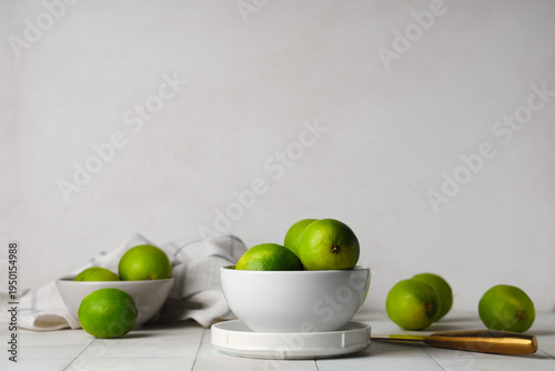 Bowls with fresh ripe limes...