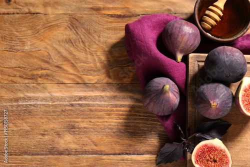 Board with fresh ripe figs,...