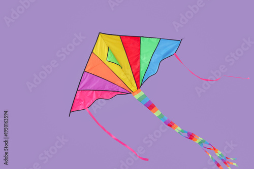 Colorful kite flying on lil...