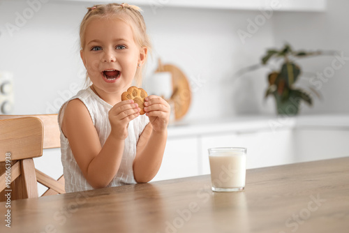 Cute little girl with tasty...