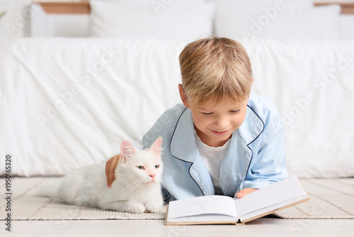 Cute little boy with cat re...