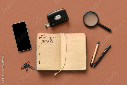Notebook with text NEW YEAR...