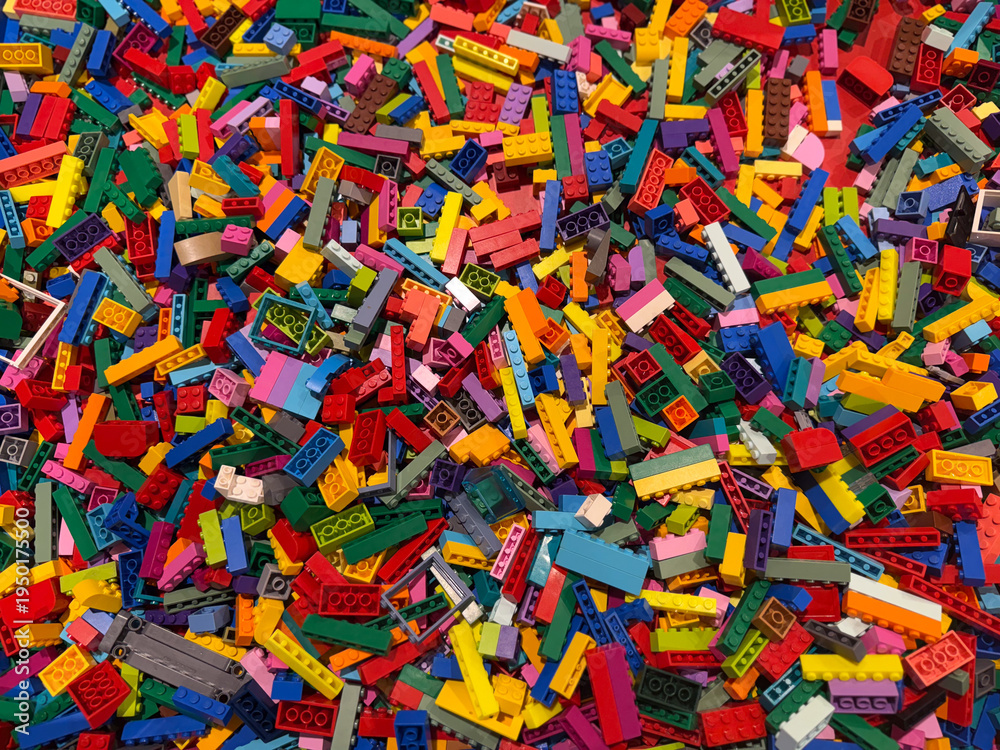 Fototapeta premium Colorful pile of small interlocking bricks