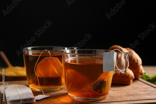 Cups of hot beverage with t...