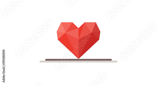 Red heart on a laptop keyboard.