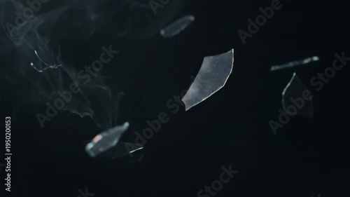 Shattered glass fragments flying isolated on transparent background