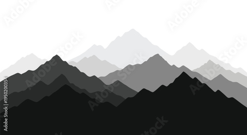 Layered mountain ranges create a dramatic grayscale silhouette