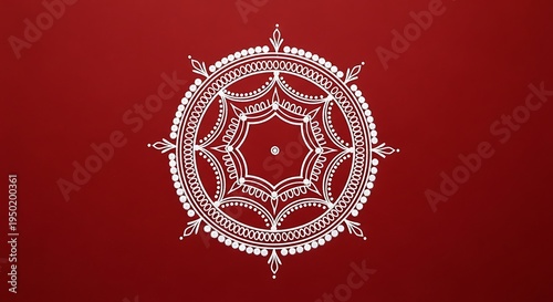 Traditional indian rangoli art pattern in white on a vibrant red background, perfect for festive celebrations and cultural events.