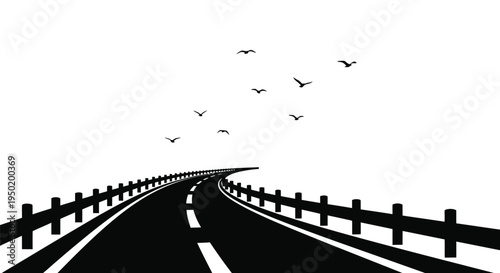 A winding road stretches toward the horizon with flying birds silhouette