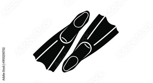 A pair of black diving fins presented in stark silhouette
