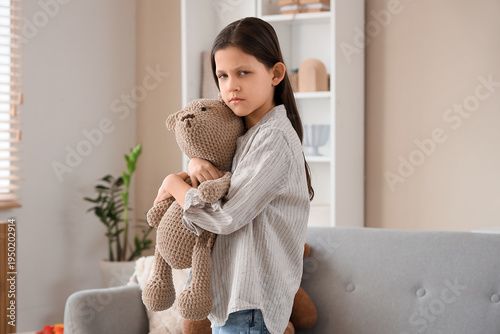 Sad girl with autistic diso...