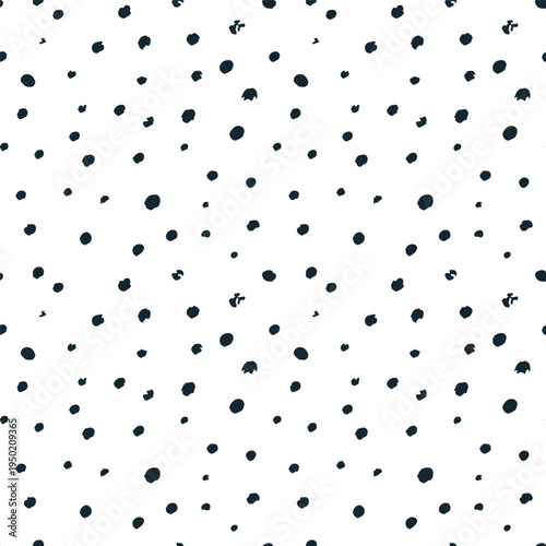 Monochrome seamless pattern of organic irregular tossed dots with hand drawn chalky texture